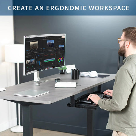 Large Height Adjustable Under Desk Keyboard Tray With Straight Up Smooth Glide Slide Out Platform Zero Hassle Ergonomic Typing Setup Rich Matte Black Computer Drawer in use at a modern workstation.