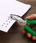 Hand using Green 3mm Round Hole Punch Handheld Paper Puncher With Soft Grip Non Slip Removable Handle for DIY crafts and paper projects