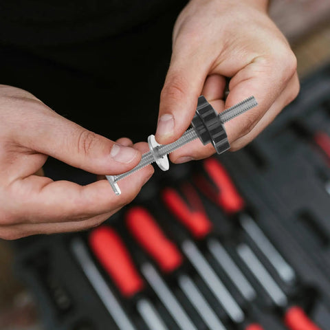 Person assembling Four Star Shaped T Track Knobs With Stainless Bolts And Washers, Ergonomic Grippy Hand Knobs For Woodworking Fixtures And Jigs.