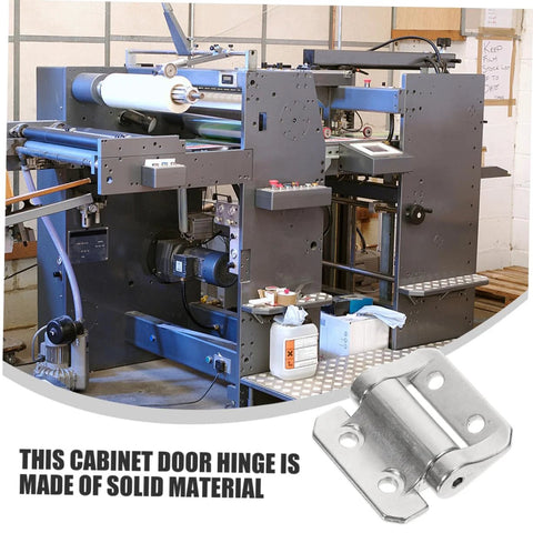 One silver metal cabinet door hinge with damping mechanism; heavy-duty, shown against an industrial machine