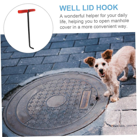 Beefy Steel Manhole Cover Lifter And Roller Shutter Door Hook With A Knuckle Friendly Grip near a manhole cover on pavement.