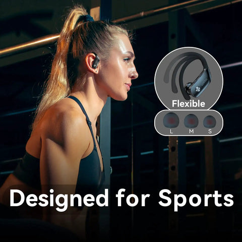 Woman wearing Wireless Earbuds Bluetooth Headphones With 80 Hour Playtime In Charging Case LED Display Over Ear Hook at gym