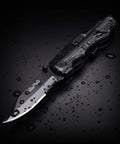 Everyday Carry Multitool For Men With Folding Knife And Pliers, Tactical Folding Tool Set in black with water droplets on blade