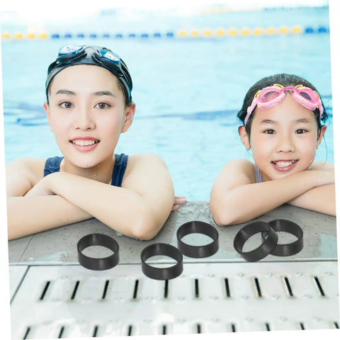 Two swimmers at a pool edge with 5 diving fixing bands 1.25in elastic rubber straps for secure backplate and waist belt in sidemount setup.