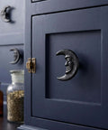 Six Piece Set Black Cast Iron Drawer Pulls And Cabinet Knobs With Crescent Moon Face Design Hand Painted In Rich Black Finish
