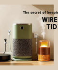 A green air purifier, humidifier, and vacuum cleaner on a wooden floor with cords neatly organized using wall clips.