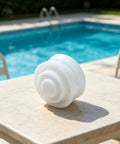 Roller Bearing Guide Kit RCX26000 RCX26001 For TigerShark Robotic Pool Cleaner DIY Friendly Pro Grade Replacement Kit Includes One RCX26001 Bearing And Two RCX26000 Bearings For Smooth Wheel Rotation And Stable Tracking, white plastic bearing on poolside table