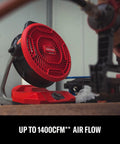 V20 Max Cordless 12 Inch Portable Fan With Dual Power Battery Or AC, 1400 CFM, on a garage workbench