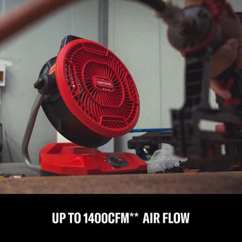 V20 Max Cordless 12 Inch Portable Fan With Dual Power Battery Or AC, 1400 CFM, on a garage workbench