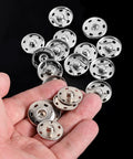 20 Sets Of 21mm Snap Buttons For Fabric And Clothes Metal Sew On Snaps Heavy Duty Snap Fasteners For Sewing Jackets Shirts DIY Crafts In Black And Silver Kit displayed on hand