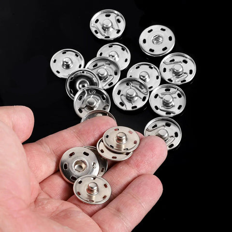 20 Sets Of 21mm Snap Buttons For Fabric And Clothes Metal Sew On Snaps Heavy Duty Snap Fasteners For Sewing Jackets Shirts DIY Crafts In Black And Silver Kit displayed on hand