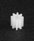 Close-up of a single plastic gear from 30 Pack Plastic Gears 8 Teeth Model 082A Reduction Gear Worm Gear Set For RC Cars And Robots, Perfect For DIY Projects
