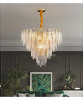 Modern Round Metal And Glass Pendant Light With Six Leds Dead Set On Making Your Space Look Fresh With Smooth Non Glare Cozy Vibes Perfect Foyer Dining Room Hanging Lamp Low Power Top Shelf Upgrade in an elegant living space with golden accents.