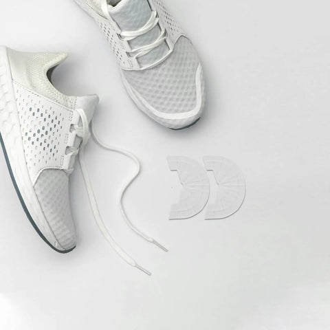 Tough As Nails Shoe Heel Pads 4Mm Thick Rubber Non Skid Adhesive Repair Kit with white sneakers on gray background.