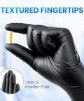 Solid Black Nitrile Gloves Large 100 Pack Heavy Duty Disposable Latex Free Powder Free Medical Exam And Food Safe Gear with textured fingertips holding a capsule.
