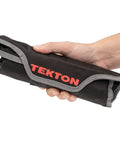 Hand holding Nine Tool Wrench Roll Organizer for stubby wrenches from one quarter to three quarters inch, durable black pouch.