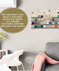 Customizable Wood Golf Ball Marker Display Case With Wall Mount For Storing 55 Markers in stylish living room setting.