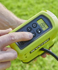Hand operating 18V One Plus Cordless Tire And Ball Inflator With Mini Compressor 11 Bar Max Fast Inflation To 32 PSI In Under A Minute Includes 3 Tips