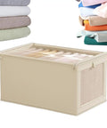 No Stress Foldable Storage Cubes With Heavy Duty Dual Handles For Thick Blankets Linens And Winter Jackets Fast To Flatten And Stack Away Every Single Day, beige fabric storage cube with clear top and stacked linens.
