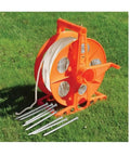 Twine Reel With 500 Ft Heavy Duty Nylon Twine, Orange Reel Dispenser For Farm, DIY, And Outdoor Projects on grass