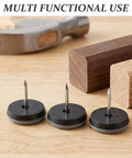 Three 12 Piece Nail On Chair Leg Sliders for Hardwood Floors with wooden blocks and hammer in background.