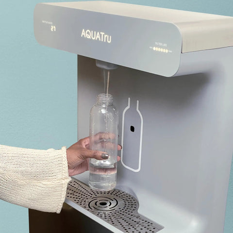 Hand using Wall Mounted Bottle Filling Station With Refrigerated Filtered Water Dispenser Touch Free Sensor 9.5 GPH Cooling Capacity