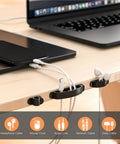 Cable organizer clips for headphones and chargers on desk, part of Two Pack Wooden Style Cable Organizer Boxes with Sixteen Cable Clips.
