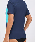 Rear view of Women's Half Zip Rash Guard Top With Built In Bra For Support And Convenience Side Pockets, navy/light blue, Size M