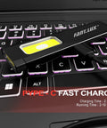 Pocket EDC Flashlight With USB C Rechargeable Power on laptop keyboard, showing charging cable connected