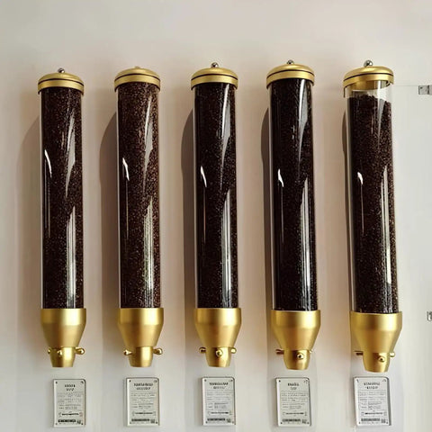 Gold Wall Mounted Coffee Bean Dispenser Set Of Four Boasts A Massive Ten Liter Transparent Jar with coffee beans.