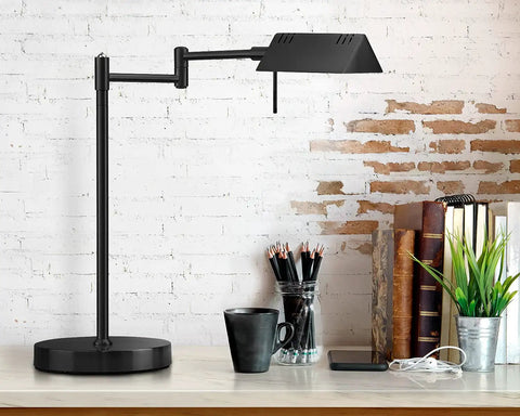 LED Desk Lamp With Full Range Dimming 12W, 1050 Lumens, 360 Degree Swing Arm on a desk, black finish, next to books and plants