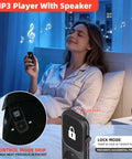 Woman enjoying music on Dope 128GB Bluetooth 5.3 MP3 Player With Built-In Speaker in bedroom at night.