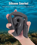Foldable Silicone Snorkel For Adults With A Wide Tube For Effortless Breathing held folded in hand view under water