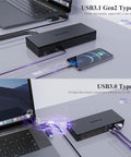 Pro Level Usb C Docking Station Packing 20 Ports With Quad Monitor Support Delivers Legit Dual 5k At 60Hertz Output Fast Charging Plus Boss 2.5G Ethernet Port For Creators Ready To Crush Multitasking Tasks connected to a laptop and smartphone.