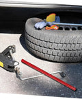 Heavy Duty Floor Jack Handle Replacement With Textured Grip Sleeve For 50 Ton Hydraulic Bottle Lifts, red handle beside tire.