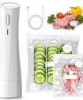 Handheld cordless vacuum sealer (white) with USB cable and two vacuum-seal bags containing cucumber slices and meat.