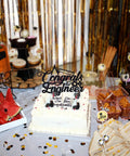 Engineer Graduation Cake Topper For Class Of 2026 on a cake, black glitter cardstock, party table decor