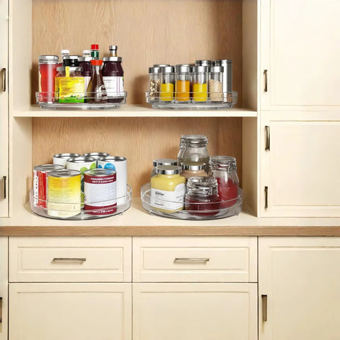 2 Pack Lazy Susan Turntable Organizer 9.5 Inch Spice Rack in kitchen cabinet with cans and jars displayed on clear non-slip trays