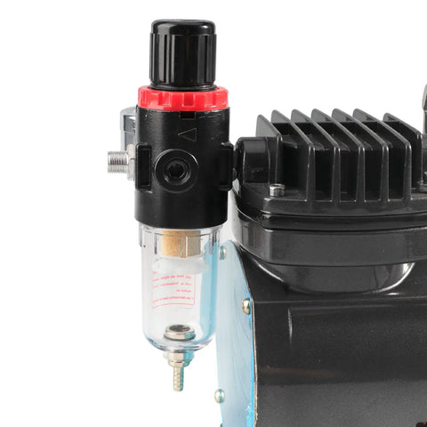 Side view of airbrush compressor inline regulator with filter and oil water trap moisture separator, pressure gauge 0-100 PSI.