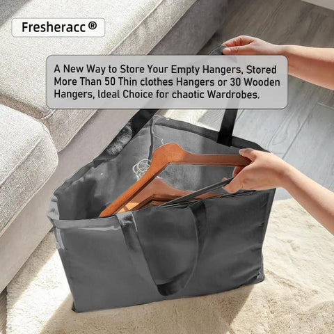 Triangle Hanger Organizer Bag For No Fuss Space Saving Closet Chaos with handles holding wooden hangers, shown in use.