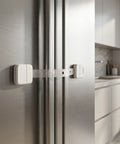 Kid Safe Cabinet Locks With Key Adhesive Baby Proof Latches for fridge doors, shown installed on silver fridge.