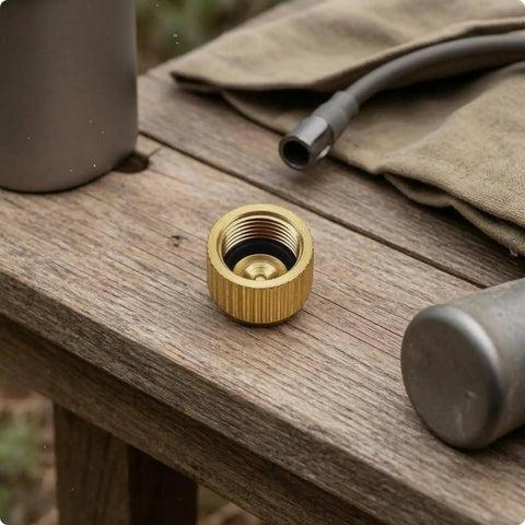 Go To Compact Brass Gas Canister Cap With Knurled Rubber Seal And End Protector on wooden table, 14x14x10mm size