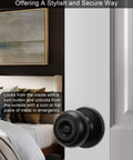 Matte Black Privacy Interior Door Knobs 8 Pack For Bedroom And Bath installed on a white door in a bedroom setting