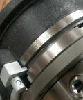 Close-up of Boss Tier 12 Inch Precision Horizontal Vertical Rotary Table With Slick Gear Drive chuck detail and vernier dial.