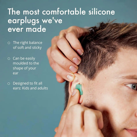 Person inserting Moldable Silicone Ear Plugs 28dB Noise Reduction For Sleeping Swimming And Concentrating Comfy Snoring Solution