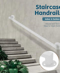 Solid As Oak Wall Mounted Wrought Iron Stair Railing Kit With Adjustable White Galvanized Tube For Indoor Or Outdoor Steps mounted alongside light gray stairs.