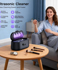 Woman using 50KHz Ultrasonic Jewelry Cleaner with Dual Modes and LED Display, on a table with watches and brushes, black model.