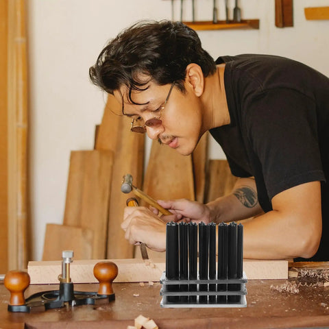 Man using Heavy Duty 28 Piece Cylindrical Transfer Punch Set Built Tough Steel For Precise Positioning And Alignment In Mechanical Repair
