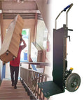 Heavy Duty Electric Stair Climbing Hand Truck That Actually Crushes Any Load With Ease For Heavy Furniture Moving And Sturdy Aerospace Steel Built To Handle Up to 882 Pounds Like A Champ Every Single Time in action on stairs.