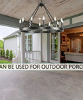 Top Tier 32 Inch Black Wagon Wheel Chandelier With 12 Lights Sleek Round Farmhouse Industrial Ceiling Light Fixture Easy Mount For High Ceilings Living Dining And Foyer in outdoor porch setting.